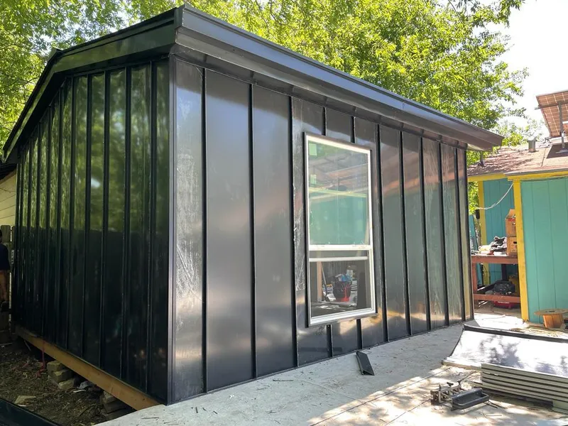 Black standing seam metal wall panels for Metal Roof Installation in Hollymead