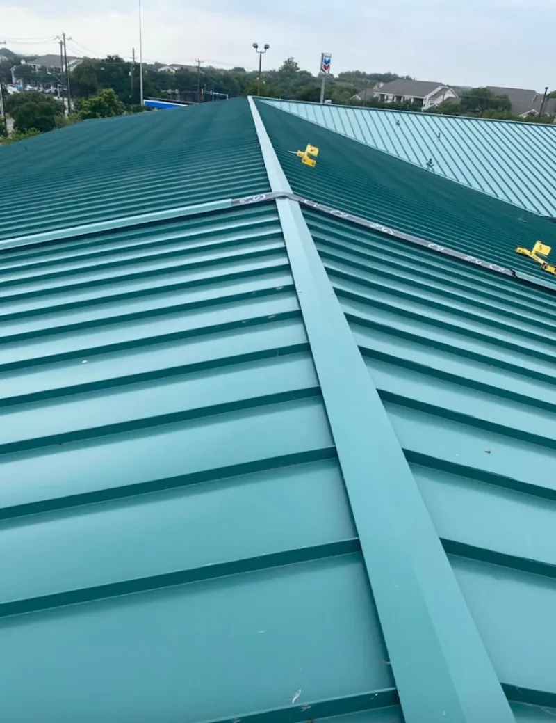 Green commercial metal roof ridge and valley for Metal Roof Repair in Hollymead